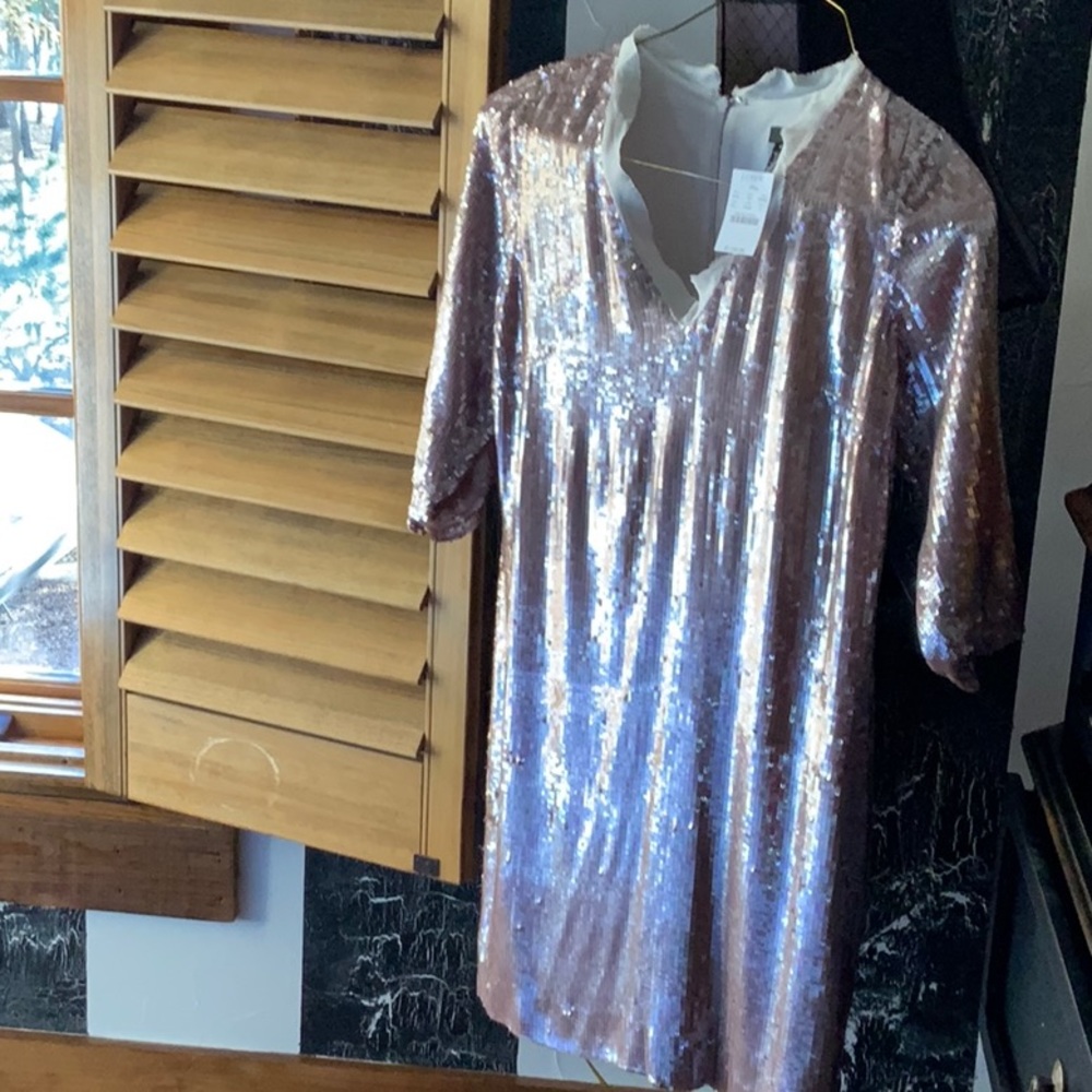 Beautiful pink/lilac sequined size 6 dress. Never worn.